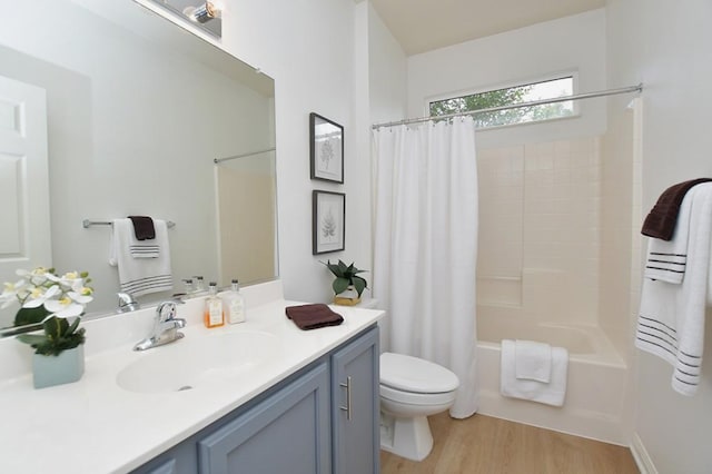 101 Scurry Pass, Georgetown, TX 78633 - full bath with vanity, shower / bath combo with shower curtain, and wood finished floors
