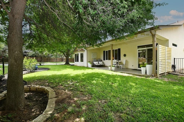 101 Scurry Pass, Georgetown, TX 78633 - rear view of property with a patio area and stucco siding