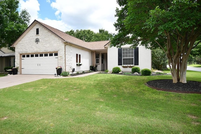 101 Scurry Pass, Georgetown, TX 78633 - view of front of property featuring an attached garage, stone siding, concrete driveway, a front lawn, and stucco siding