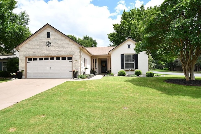 101 Scurry Pass, Georgetown, TX 78633 - ranch-style home with a garage, concrete driveway, a front lawn, stone siding, and stucco siding