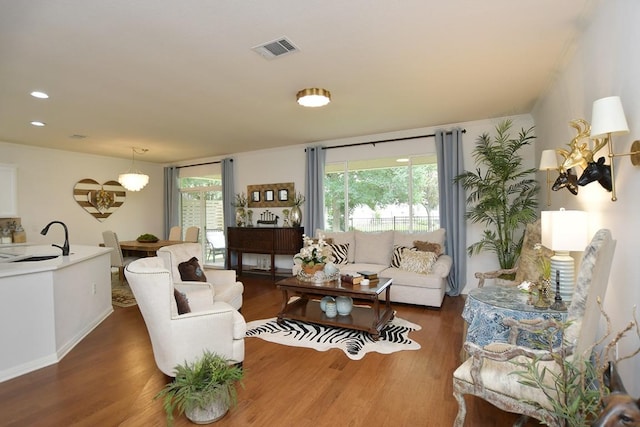 101 Scurry Pass, Georgetown, TX 78633 - living area with wood finished floors and recessed lighting