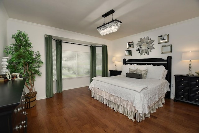 101 Scurry Pass, Georgetown, TX 78633 - bedroom featuring crown molding and wood finished floors