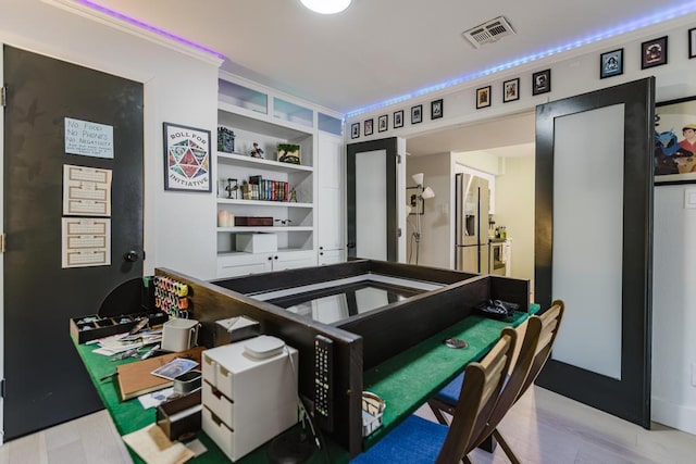 909 Reinli St Unit 102, Austin, TX 78751 - rec room with wood finished floors
