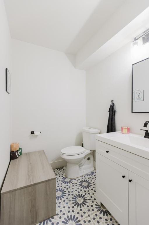 909 Reinli St Unit 102, Austin, TX 78751 - bathroom featuring vanity and toilet