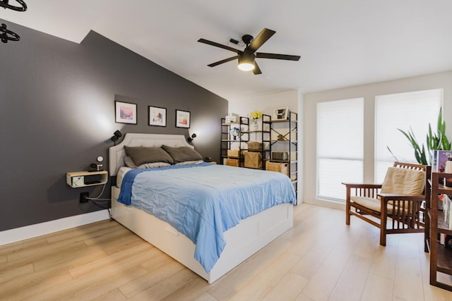 909 Reinli St Unit 102, Austin, TX 78751 - bedroom featuring light wood-style floors and ceiling fan