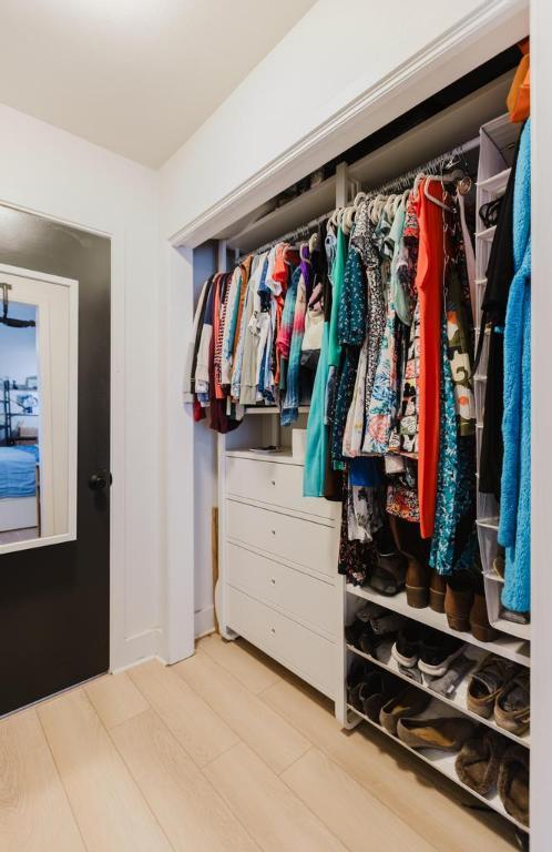 909 Reinli St Unit 102, Austin, TX 78751 - walk in closet with wood finished floors