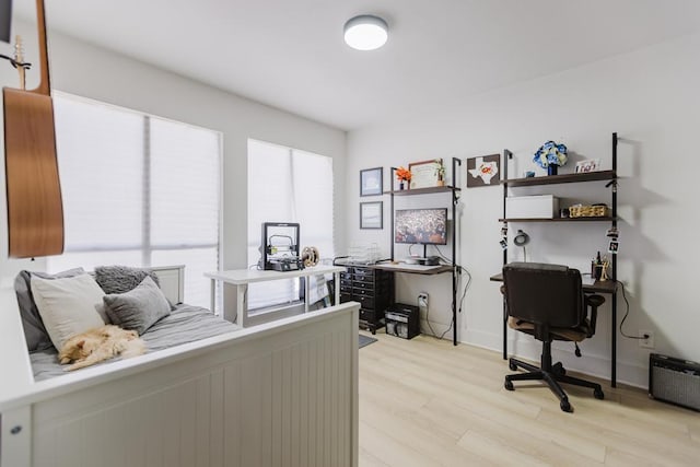 909 Reinli St Unit 102, Austin, TX 78751 - home office featuring light wood finished floors
