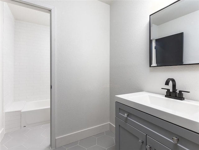 909 Reinli St Unit 102, Austin, TX 78751 - full bath featuring vanity, tile patterned flooring, and shower / tub combination