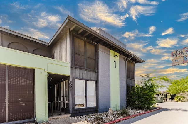 909 Reinli St Unit 102, Austin, TX 78751 - view of side of property with brick siding