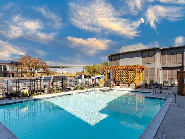 909 Reinli St Unit 102, Austin, TX 78751 - community pool with a pergola and a patio area