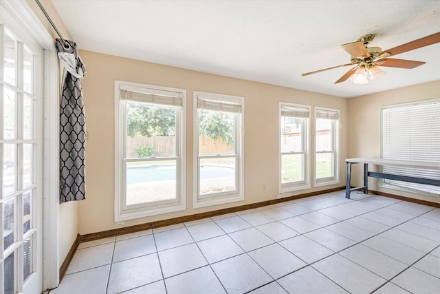 5519 Coon Tree Ct, Humble, TX 77346 - unfurnished room with baseboards, light tile patterned floors, and ceiling fan