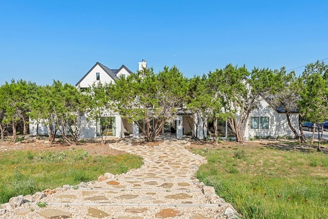 1769 Parten Ranch Pkwy, Austin, TX 78737 - view of front of property featuring a chimney