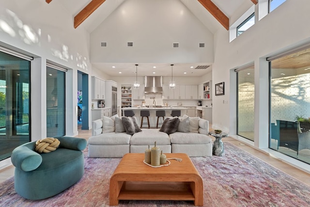 1769 Parten Ranch Pkwy, Austin, TX 78737 - living area with high vaulted ceiling and beamed ceiling