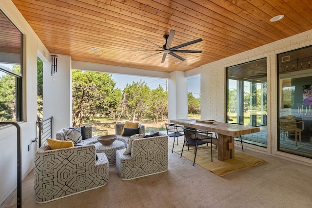 1769 Parten Ranch Pkwy, Austin, TX 78737 - sunroom featuring outdoor dining space, an outdoor living space, wooden ceiling, ceiling fan, and carpet flooring