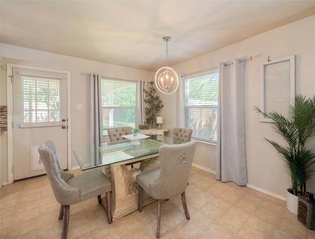 107 Wisteria Way, San Marcos, TX 78666 - dining room with a chandelier and baseboards