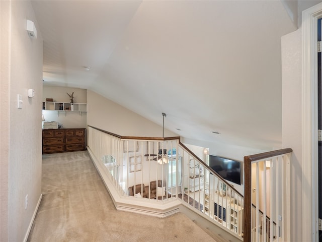 107 Wisteria Way, San Marcos, TX 78666 - hallway with lofted ceiling and carpet