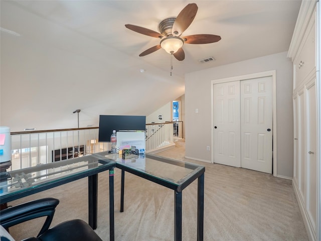 107 Wisteria Way, San Marcos, TX 78666 - home office featuring a ceiling fan, light colored carpet, vaulted ceiling, and baseboards