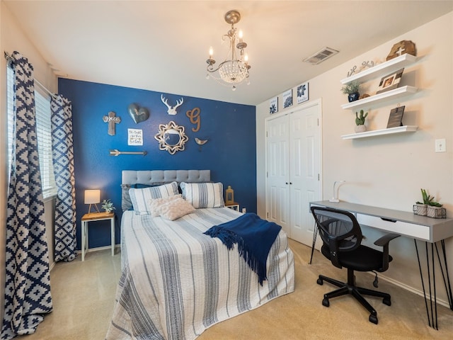 107 Wisteria Way, San Marcos, TX 78666 - carpeted bedroom with a chandelier, a closet, baseboards, and an office area