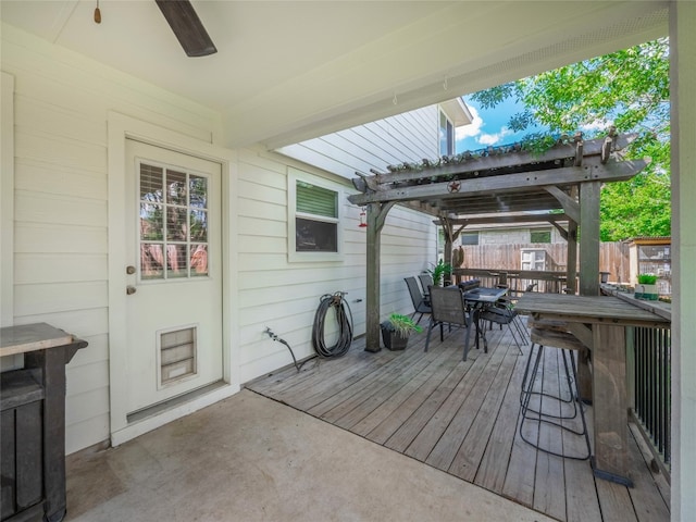 107 Wisteria Way, San Marcos, TX 78666 - wooden deck with fence, a ceiling fan, and outdoor dining space