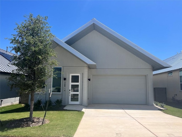 120 Rough Creek Rd, Georgetown, TX 78628 - view of front facade featuring driveway, an attached garage, and a front lawn