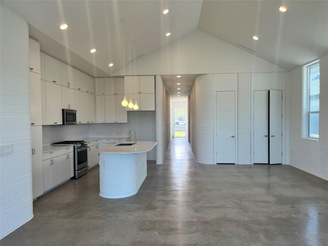 120 Rough Creek Rd, Georgetown, TX 78628 - kitchen with appliances with stainless steel finishes, a sink, finished concrete flooring, an island with sink, and white cabinets