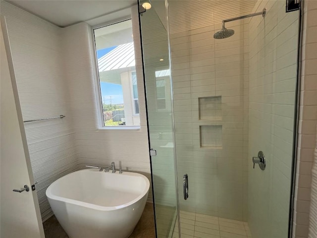 120 Rough Creek Rd, Georgetown, TX 78628 - bathroom with a stall shower and a freestanding tub