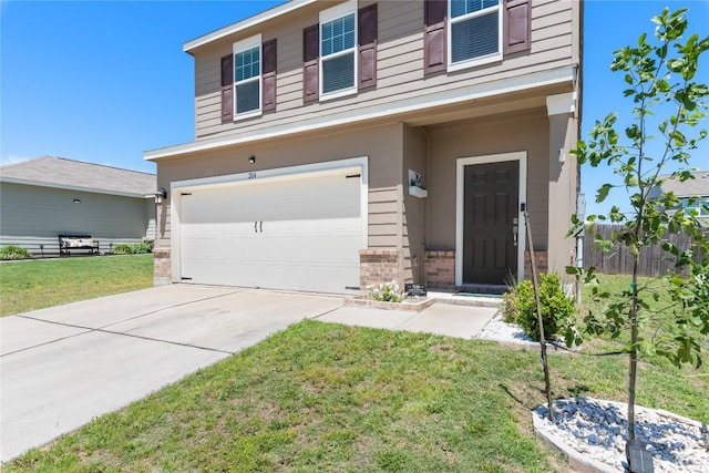 204 Peony Ln, Jarrell, TX 76537 - view of front of property with an attached garage, brick siding, and concrete driveway
