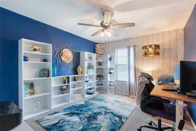 204 Peony Ln, Jarrell, TX 76537 - carpeted home office with wallpapered walls and ceiling fan