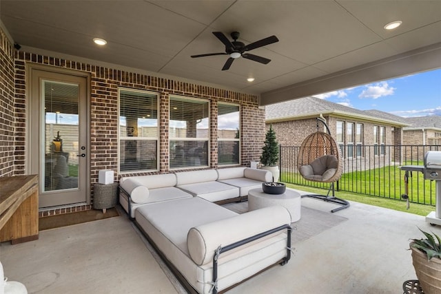 view of patio / terrace featuring a ceiling fan, an outdoor hangout area, and fence