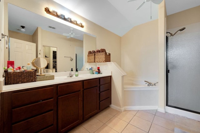 213 Sapphire Ln, Jarrell, TX 76537 - full bathroom with a ceiling fan, a stall shower, tile patterned flooring, and vaulted ceiling