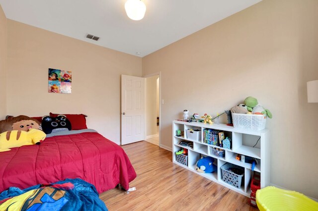 213 Sapphire Ln, Jarrell, TX 76537 - bedroom featuring wood finished floors