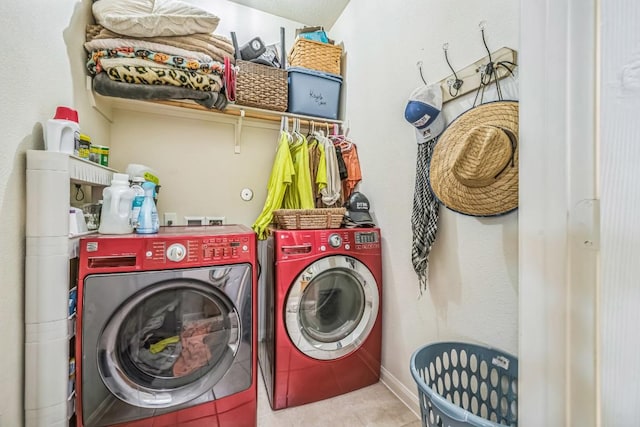 213 Sapphire Ln, Jarrell, TX 76537 - washroom with independent washer and dryer, tile patterned floors, and baseboards