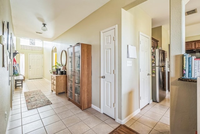 213 Sapphire Ln, Jarrell, TX 76537 - hallway with light tile patterned floors
