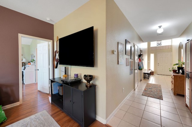 213 Sapphire Ln, Jarrell, TX 76537 - entrance foyer featuring light wood-style floors and baseboards