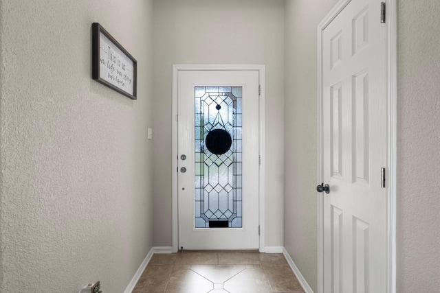 3585 W Amity Rd, Salado, TX 76571 - entryway featuring tile patterned flooring, baseboards, and a textured wall