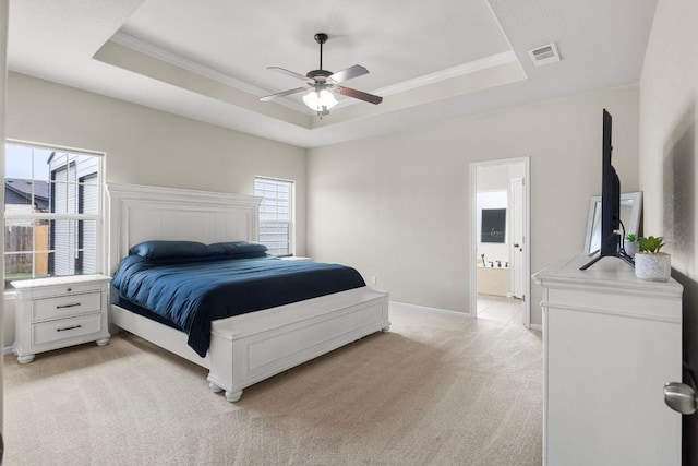 3585 W Amity Rd, Salado, TX 76571 - bedroom featuring a raised ceiling, light colored carpet, crown molding, baseboards, and ensuite bath