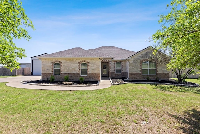 3585 W Amity Rd, Salado, TX 76571 - french country home featuring brick siding, a garage, roof with shingles, and concrete driveway