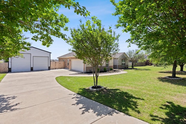 3585 W Amity Rd, Salado, TX 76571 - view of front of property featuring brick siding, a detached garage, and an outbuilding