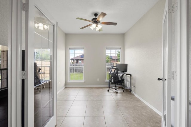 3585 W Amity Rd, Salado, TX 76571 - office area with ceiling fan, baseboards, and light tile patterned flooring