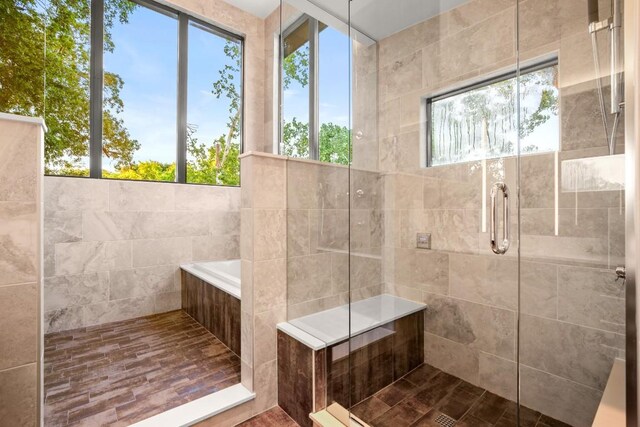 1705 Collier St, Austin, TX 78704 - full bathroom with a stall shower and a bath