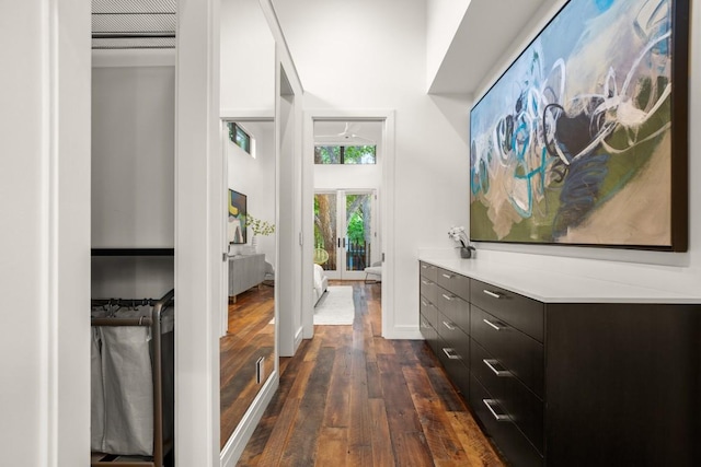 hallway featuring dark wood-style flooring