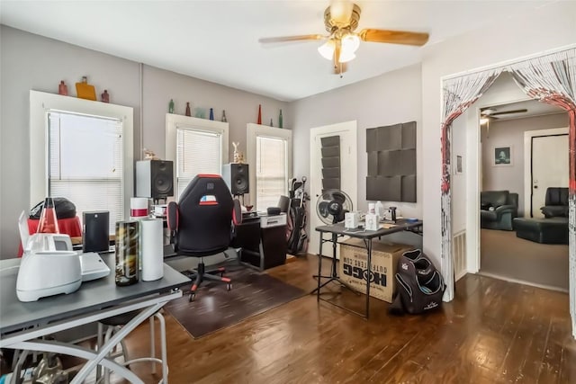 300 Bishop St, Smithville, TX 78957 - home office with a ceiling fan and wood finished floors