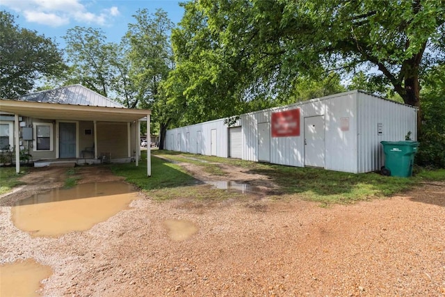 300 Bishop St, Smithville, TX 78957 - view of yard featuring a porch and a garage