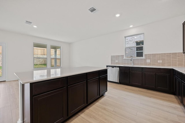 3740 Liberi Ln, Round Rock, TX 78655 - kitchen featuring dishwasher, plenty of natural light, light countertops, and recessed lighting