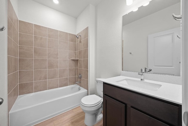 3740 Liberi Ln, Round Rock, TX 78655 - bathroom with wood finished floors, vanity, and tub / shower combination