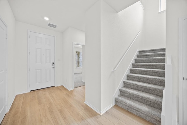 3740 Liberi Ln, Round Rock, TX 78655 - entrance foyer featuring stairway, light wood-style flooring, and recessed lighting