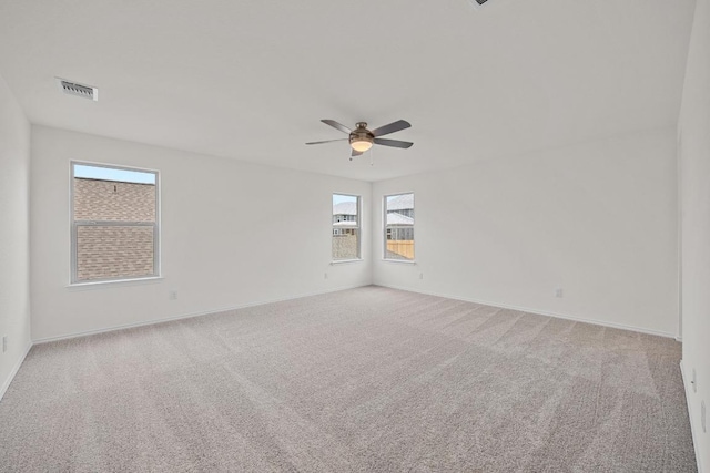 3740 Liberi Ln, Round Rock, TX 78655 - empty room featuring ceiling fan and light carpet