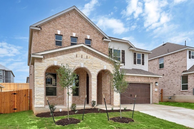 3740 Liberi Ln, Round Rock, TX 78655 - view of front of property with covered porch, concrete driveway, a garage, and brick siding