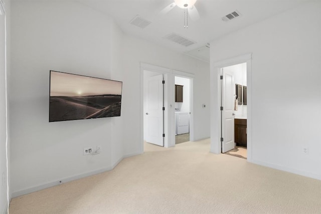 4108 Berkman Dr, Austin, TX 78723 - unfurnished bedroom featuring connected bathroom, washer / clothes dryer, carpet, and baseboards