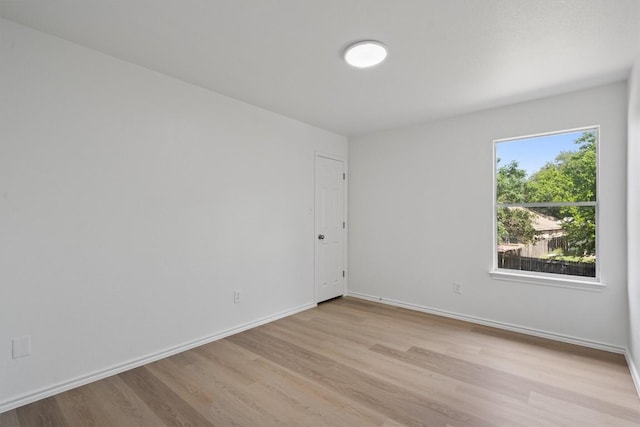 1816 Melissa Oaks Ln, Austin, TX 78744 - empty room with wood finished floors and baseboards